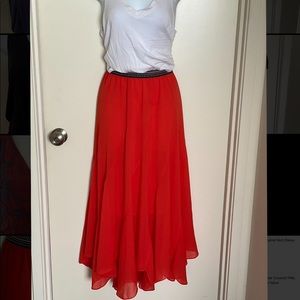 Flowy long orange skirt. Anthropologie.